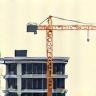 Icon representing a construction crane and building frame.